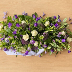 Coussin mauve et blanc (D06)